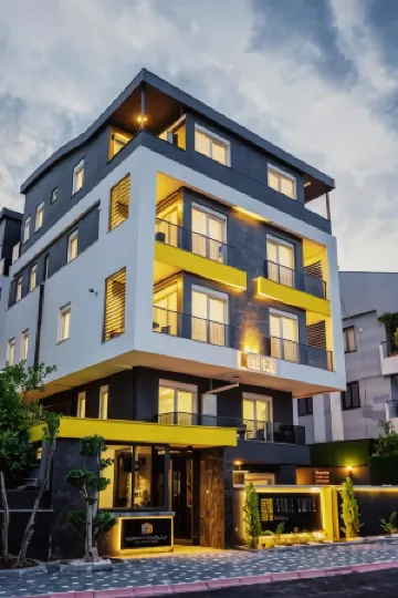 Stile Suite Family Hotel Отели рядом с достопримечательностью «Пляж Коньяалты»