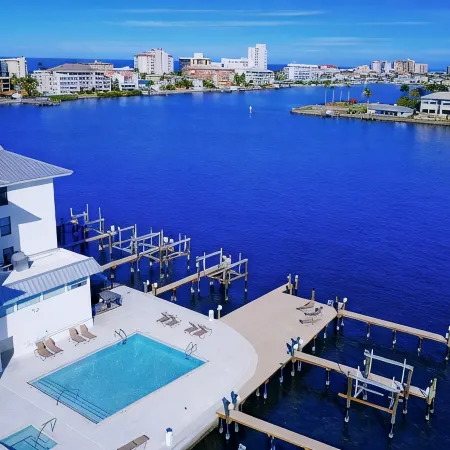 Vanderbilt Beach Condo, Bay Views, New Saltwater Pool, Walk to Beach
