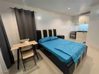 Cozy Studio Type unit w/ TV, Wifi, hotshower & ref - parking