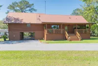 BEAUTIFUL WATERFRONT .  GNAT SCREENED BOATHOUSE AND AJOINING COVERED BOAT SLIPS