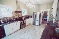 That Place on 6th Street close to downtown, beaches, & private backyard