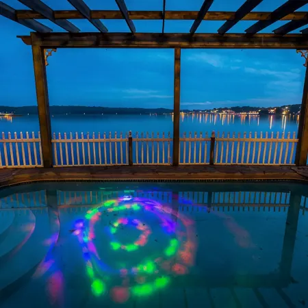 8500 sf, Sleeps 48 in beds, Pool, Hot Tub, Game Rm, 300 ft lake front, In town