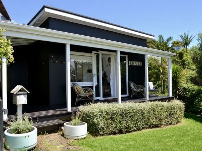 Rosie's cottage in Stanmore Bay , a short walk to beach with a great seaview.