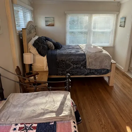 Cozy Cottage with access to and partially obstructed views of the bay.