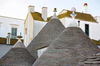 Le Alcove - Luxury Hotel Nei Trulli Отели в г. Альберобелло