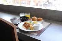 Kochi Pacific Hotel - servizio colazione