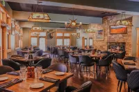 Flying Saddle Resort and Steak House Hotels in Alpine Northwest