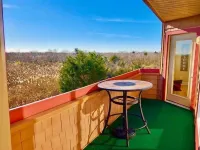 *Serenity Beach Front*