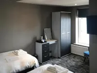 The Grotto Hotels near Sandhaven Beach
