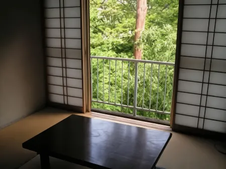 Minshuku Unzenya Отели в г. Ниситама