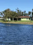 beautiful home on a 3 acre lake with security