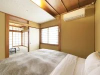 Zaimoku Sakaeya Ryokan - С баром