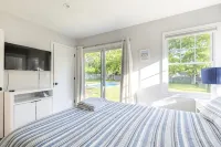 Chic Hamptons Home with Heated Gated Pool and Grill - 4-Star