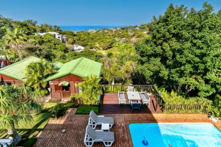 Zuider Zee Guest House Отели в г. Баллито