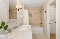 Cozy cottage surrounded by trees and sounds of nature with new hot tub.