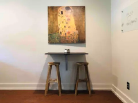 Relaxing Backyard and Cozy Seating Area - Charming Urban Haven