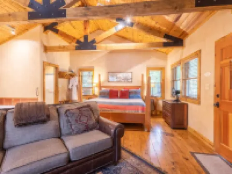 Whirlpool and Cozy Fireplace - Charming Riverbank Sanctuary