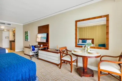 Ocean View Balcony and Outdoor Pool Amenities - Charming Escape
