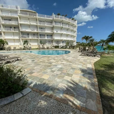 Oceanfront Paradise: Luxurious Penthouse with Spectacular Pools and Peloton