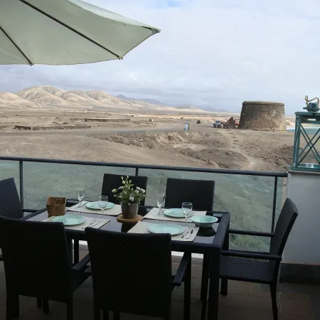 Best location on 2 floors (with penthouse) directly by the sea. Dream view from 3 terraces