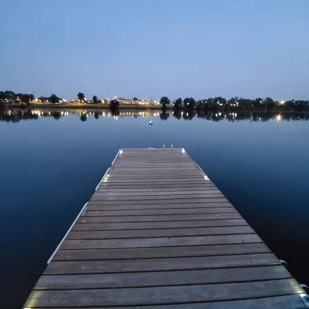 Lakefront Getaway. Private Waterfront Home with Dock and Sunroom.
