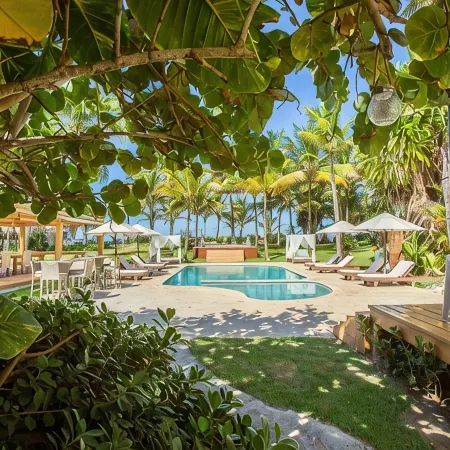 Award-Winning Beachfront VillaSleeps 28  • Full Staff • Pool Spa Private Beach