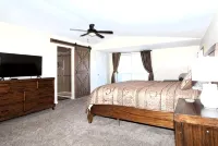 Totally Remodeled- All New Furnishings- Backs to Golf Course- Great Base Camp - 4-Star