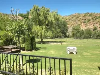 Old Mill Lodge, Seasonal Working Ostrich Farm & Restaurant, Oudtshoorn - Bergblick