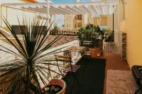 Happy House Comfort Plus Hotels near Paco Episcopal