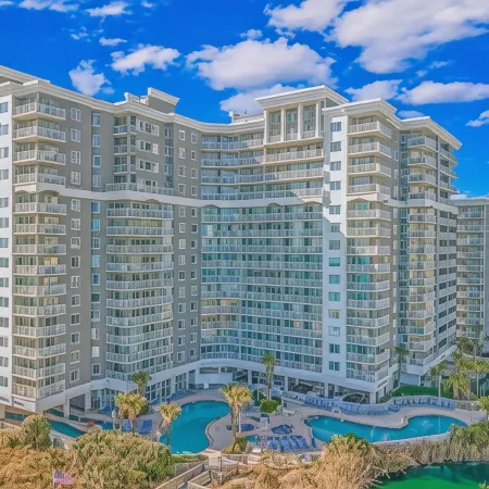 Sea Watch Resort Отели рядом с достопримечательностью «Поле для гольфа Barefoot Landing»