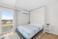 Balcony and Pool Steps from the Beach - Spectacular Coastal Haven