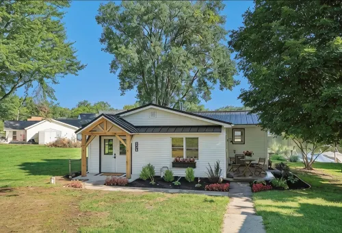 This house is located on North Webster Lake and features a hot tub. - Gym
