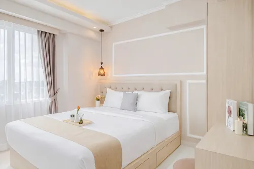 2Br Corner with South and East View at Podomoro Golf View Apartment by Travelio - 3-Star