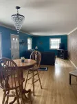 3 bedroom/2 bath home; close to EAA. Large kitchen and outside deck area.