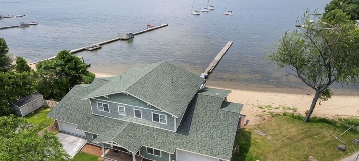 The Eastside ~ Modern Coastal Getaway w/ Pool, Private Beach, Sauna and Dock Hotels in Chittenden County