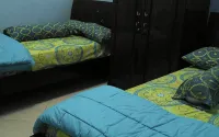 Comfy Room at Honey Guesthouse Syariah - Haustierfreundliche