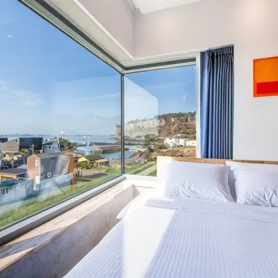 Seogwipo Common Stay Pension Отели рядом с достопримечательностью «Гора Санбансан»