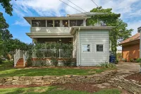 Historic house on tree lined red brick street of historic homes. - WiFi