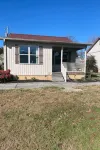 Lakefront Cabin in quiet cove. No steps to private boat slip. Pet friendly. - ブティック