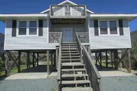 Just steps to the beach, bar, and playground park! - 2-Star