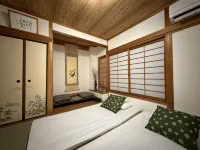 InnMi Zizhu (Midosuji Line Daikokucho Station) 5 minutes walk, one stop to Namba Shinsaibashi