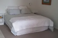 Wainui Absolute Beachfront Studio Unit Hotels in 