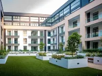 Embassy Gardens Luxury Suites Cpg Hotels near Labadi