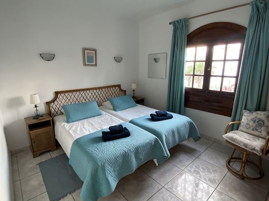 2 Heated Communal Pools and a splash pool with Sea Views