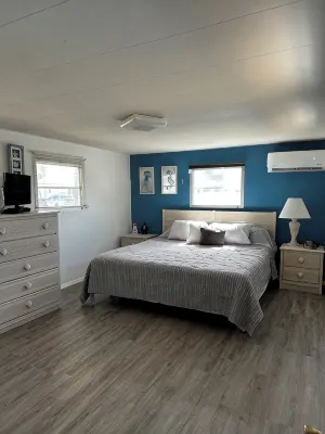 Canal-Front Coastal Escape with Private Dock & King Suite - Homestays