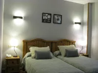 Aparthotel Sarrato - Apartments