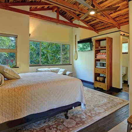 Escape to your private oasis perched on a cliff with a jungle view