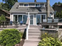 Experience Lake Life at Our 3-Bedroom Beachfront Cottage, Near Grand Rapids. - 4-Star