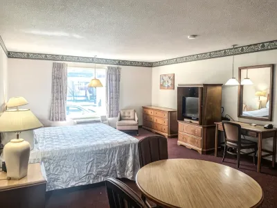 Econo Lodge Inn & Suites Отели в г. Уиннемакка