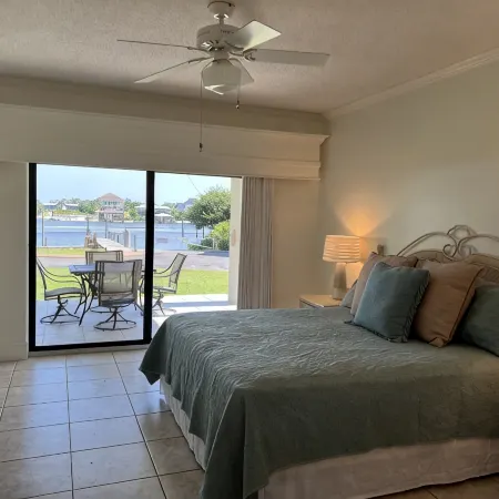Ground floor condo with walk out access to docks, fishing piers and pool